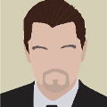 icomania:Man with brown hair in black and white suit.