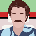 icomania:Man with brown mustache and blue shirt.