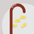 icomania:A brown cane with four yellow pills on a white plate