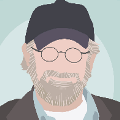 icomania:A man with a navy blue cap and a grey beard with glasses