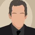 icomania:A man with greyish black hair and wearing a dark suit and tie